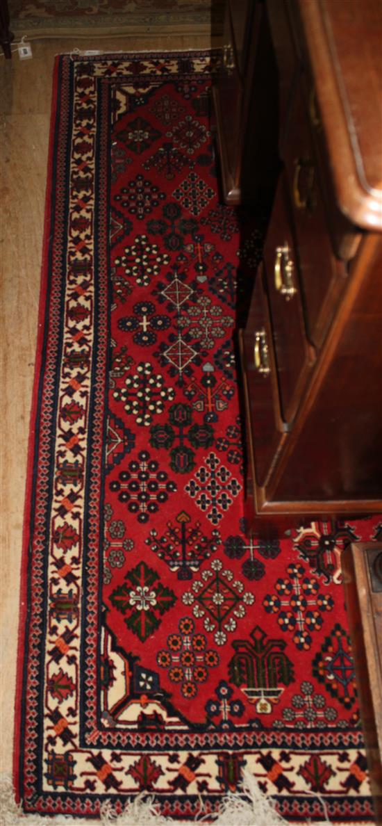 Persian red-ground rug(-)